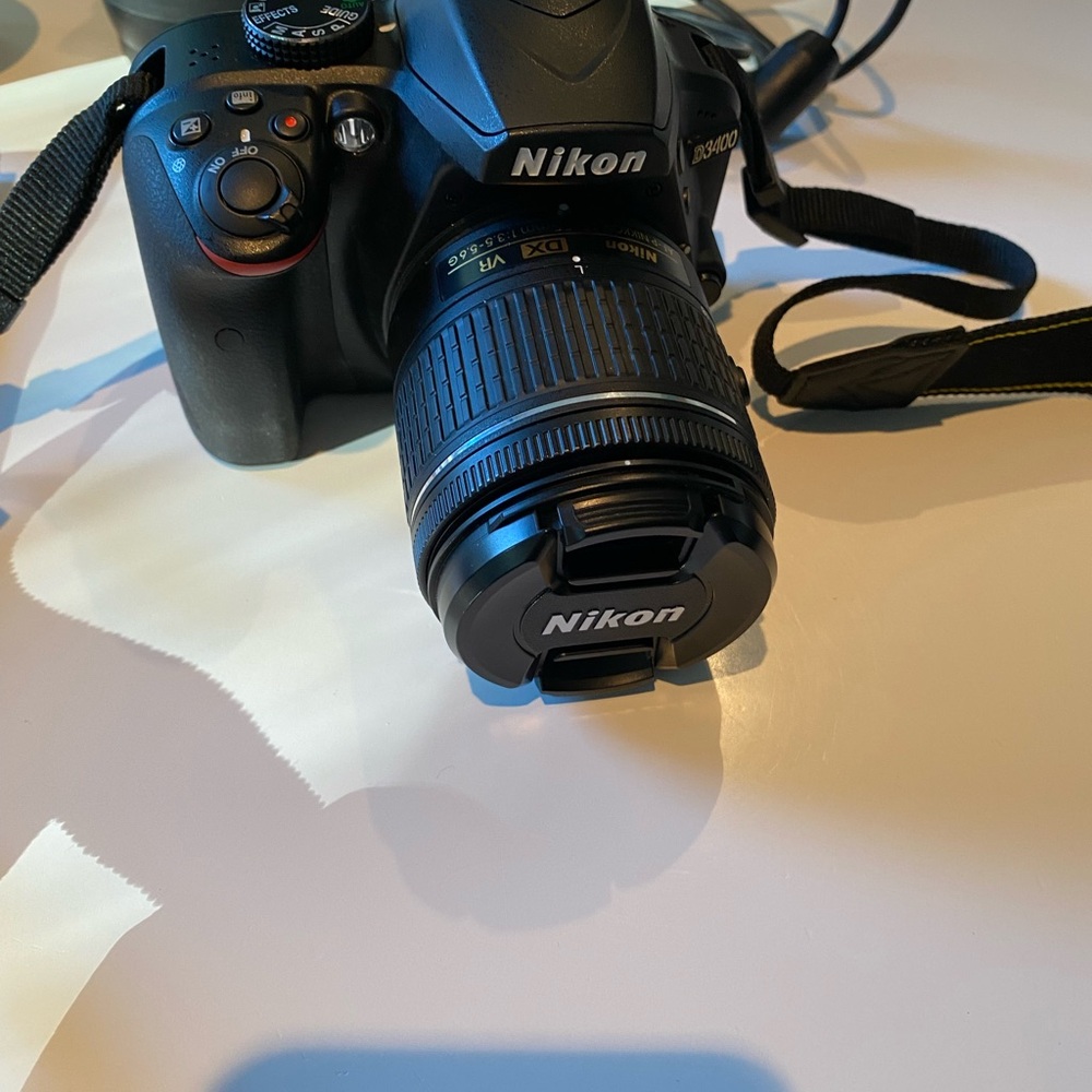 Nikon D3400 DSLR Camera in Black with Black Lens Cap
